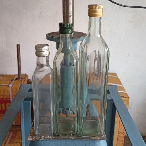 OLIVE OIL HAND SEALING MACHINE A-9